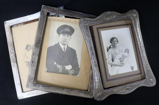 Three assorted early 20th century silver photograph frames,